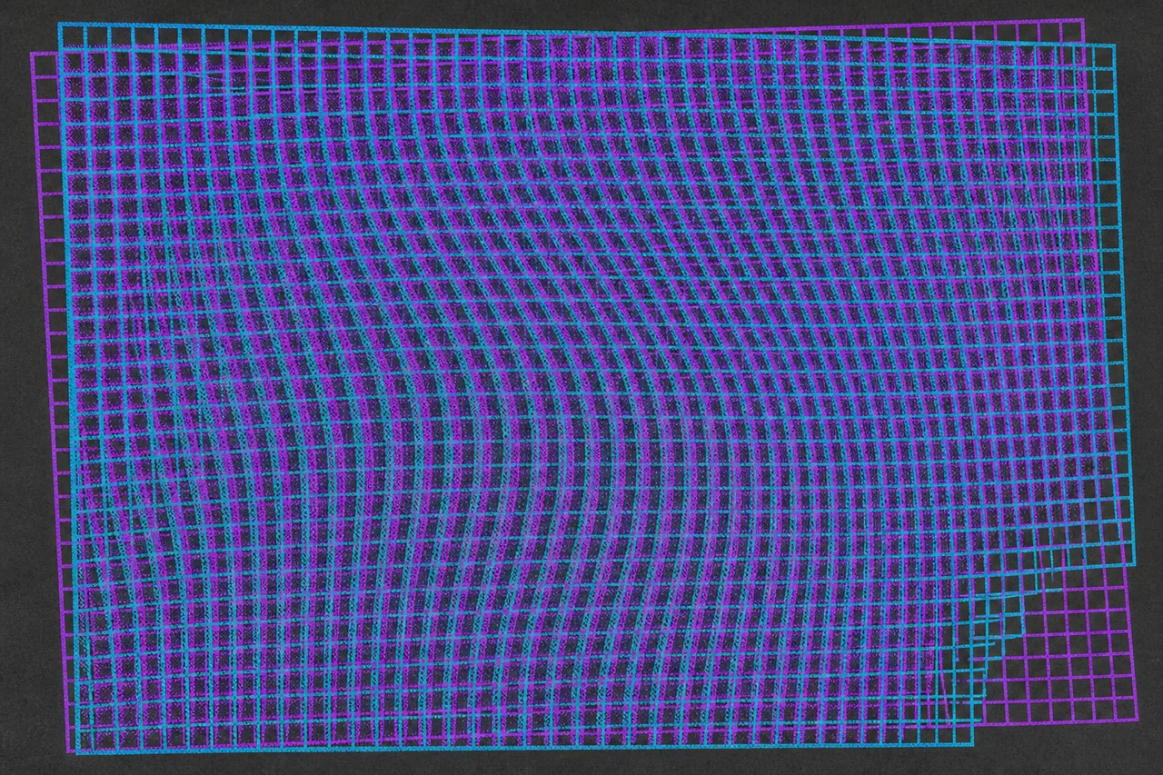 Two fine grids laid over each other at a slight rotation, producing broad moiré bands, with one corner where the grids separate and their rulings show.